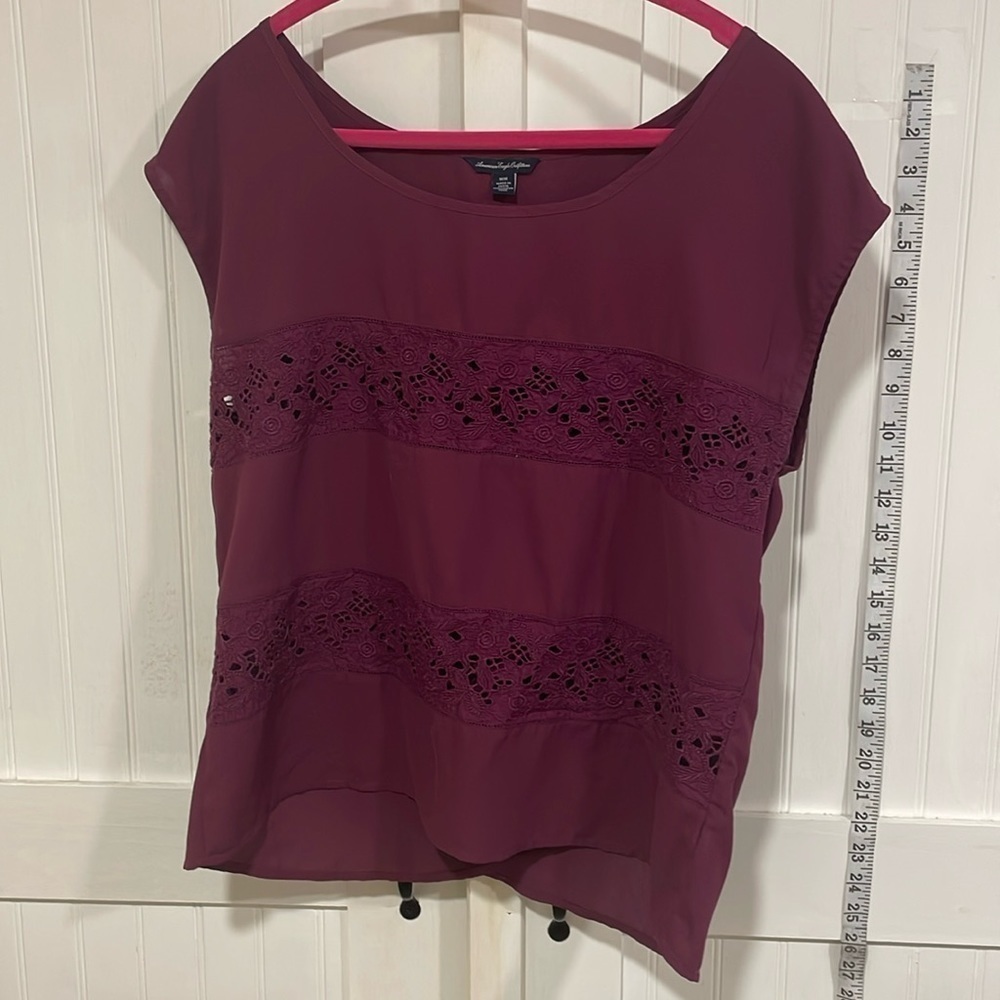 American Eagle outfitters plum top with two eyelet sections in front, size M